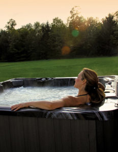 Woman Relaxing in Hot Tub